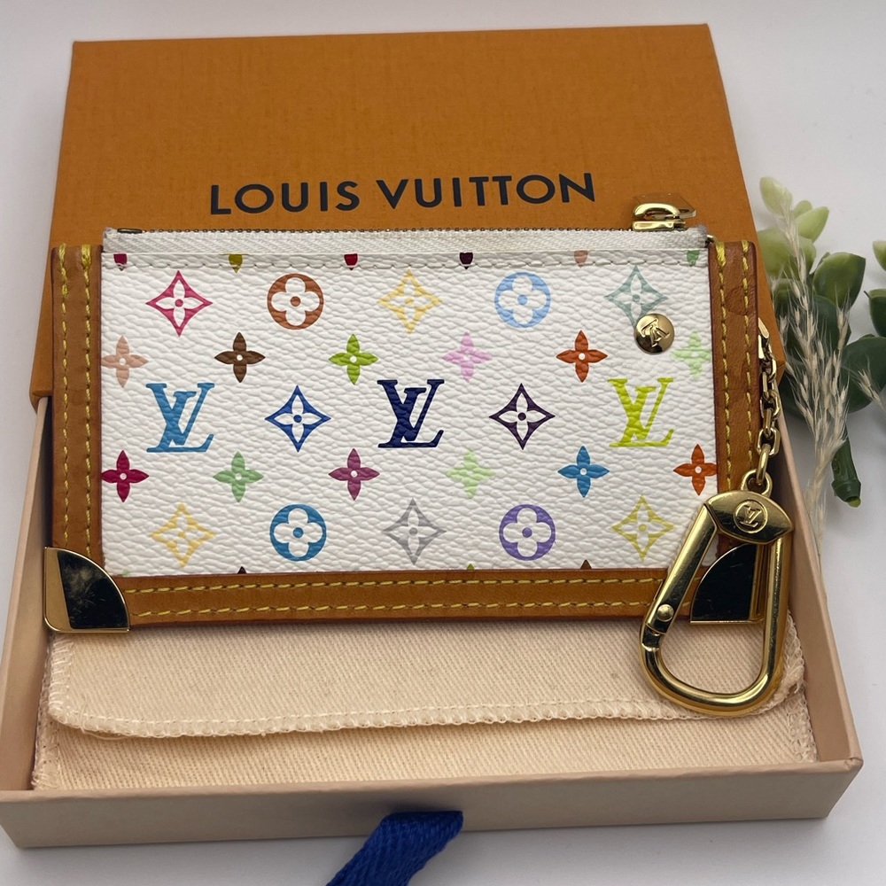 Authentic pre-loved LV multi-color key cles in very good condition.